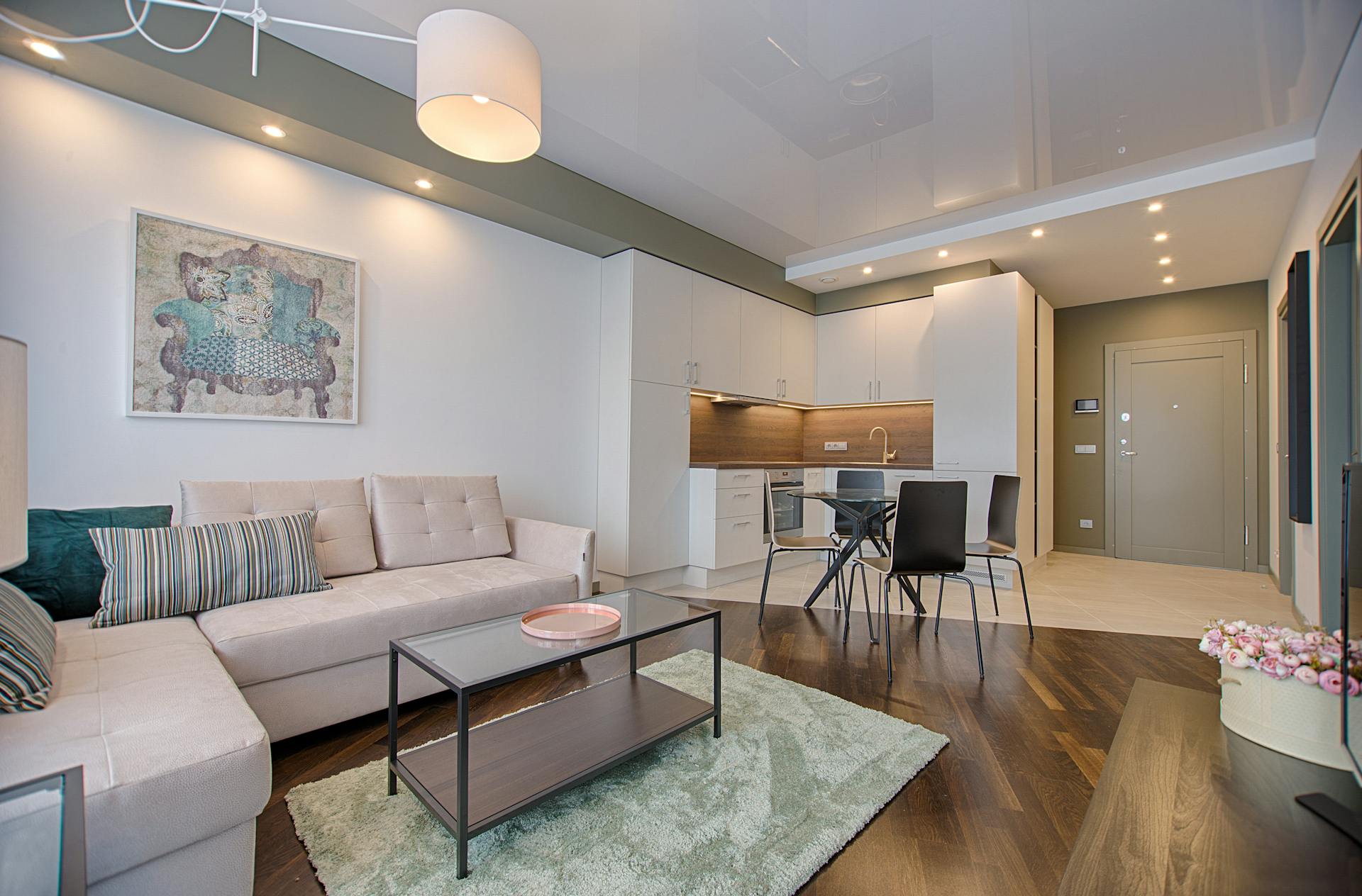 a new build open-plan kitchen and living area with a sofa